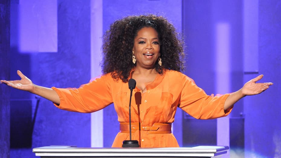 Oprah Winfrey, known for her busy schedule, credits a consistent sleep routine for maintaining her energy levels and positive outlook. Image Source: CNBC